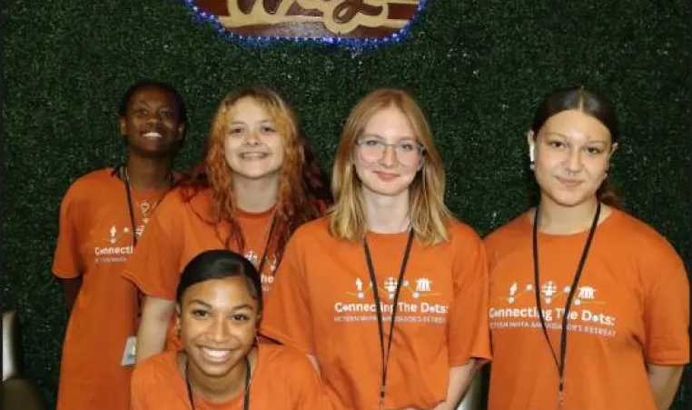 five teenage girls from New RIver YMCA smile for photo