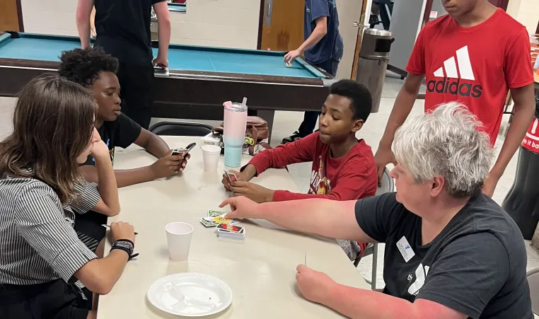 teens gathered with YMCA staff for a teen night